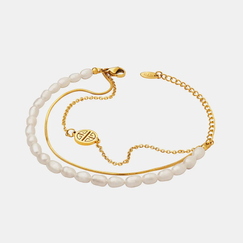 Pulsera de perlas de tres capas en acero de titanio