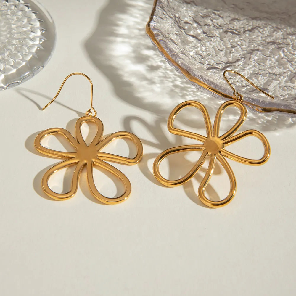 Pendientes flor minimalista en acero inoxidable