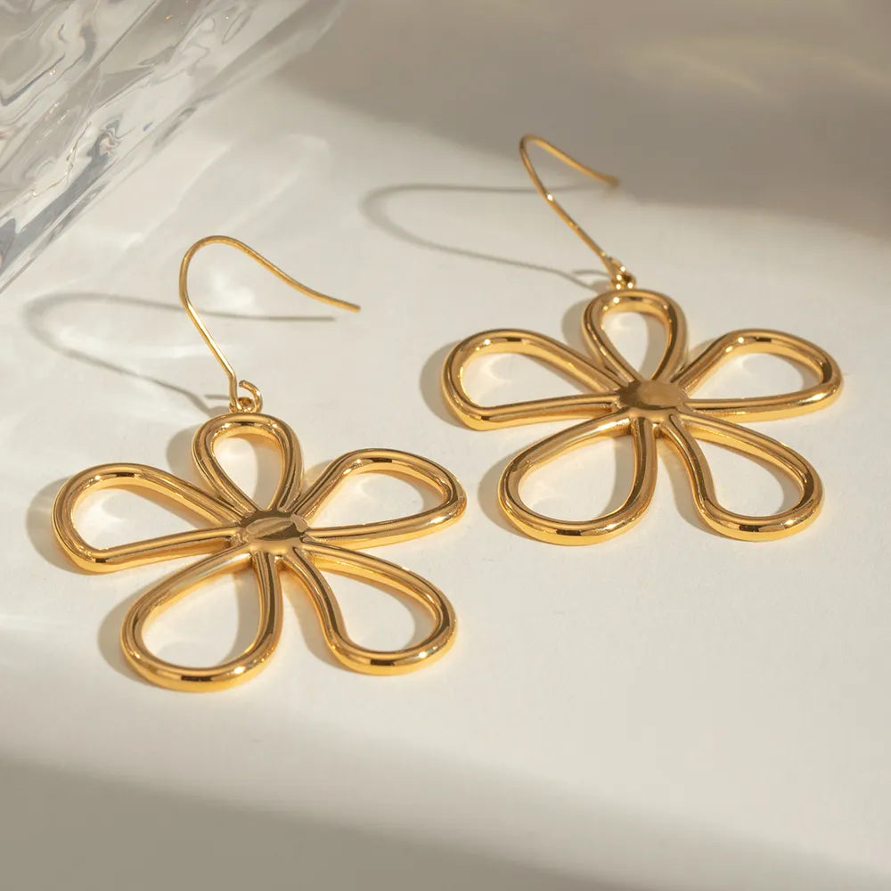 Pendientes flor minimalista en acero inoxidable
